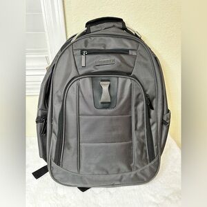 Perry Ellis Gray Backpack with padded laptop compartment.